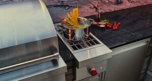 Your Wolf 13” side burner can be built into the counter right next to your grill, perfect for pasta, sauces, corn and more.