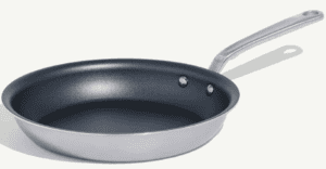 A nonstick frying pan, perfect for any cooktop, features a long metal handle and is displayed on a plain light background.